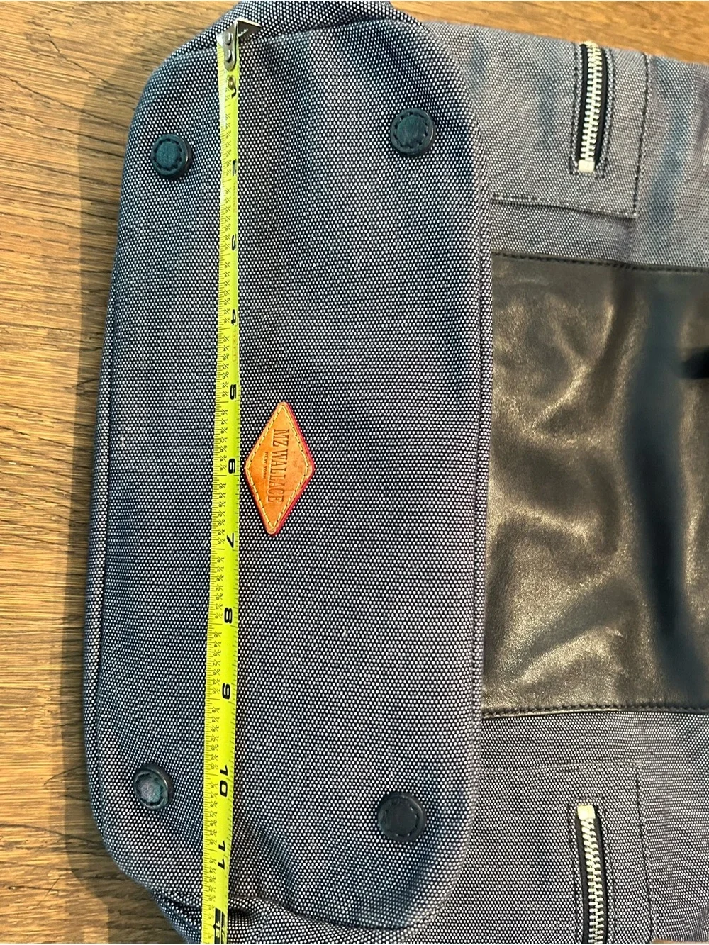 MZ Wallace navy canvas tote with leather pocket and handles